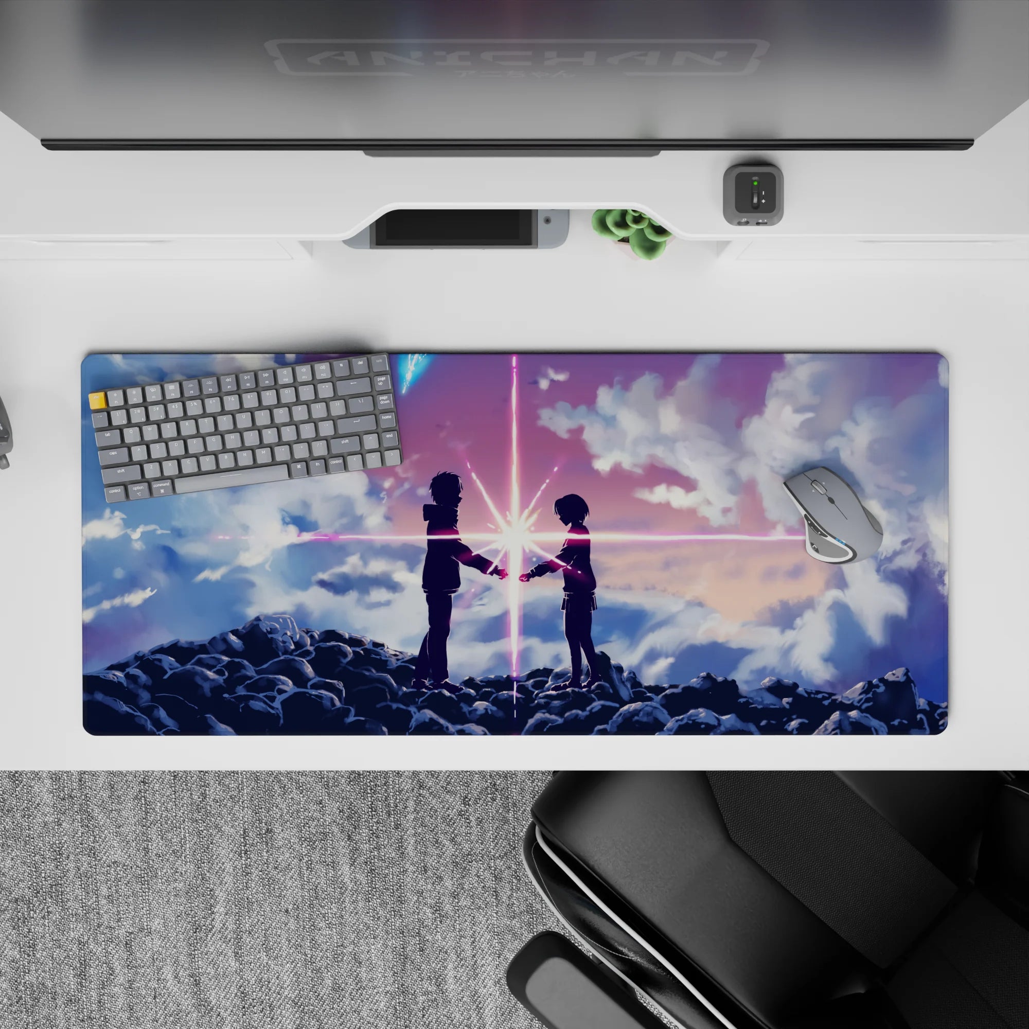 36x16 inches anime desk pad in pink, violet, and blue beams with dreamy cosmic romance mood.