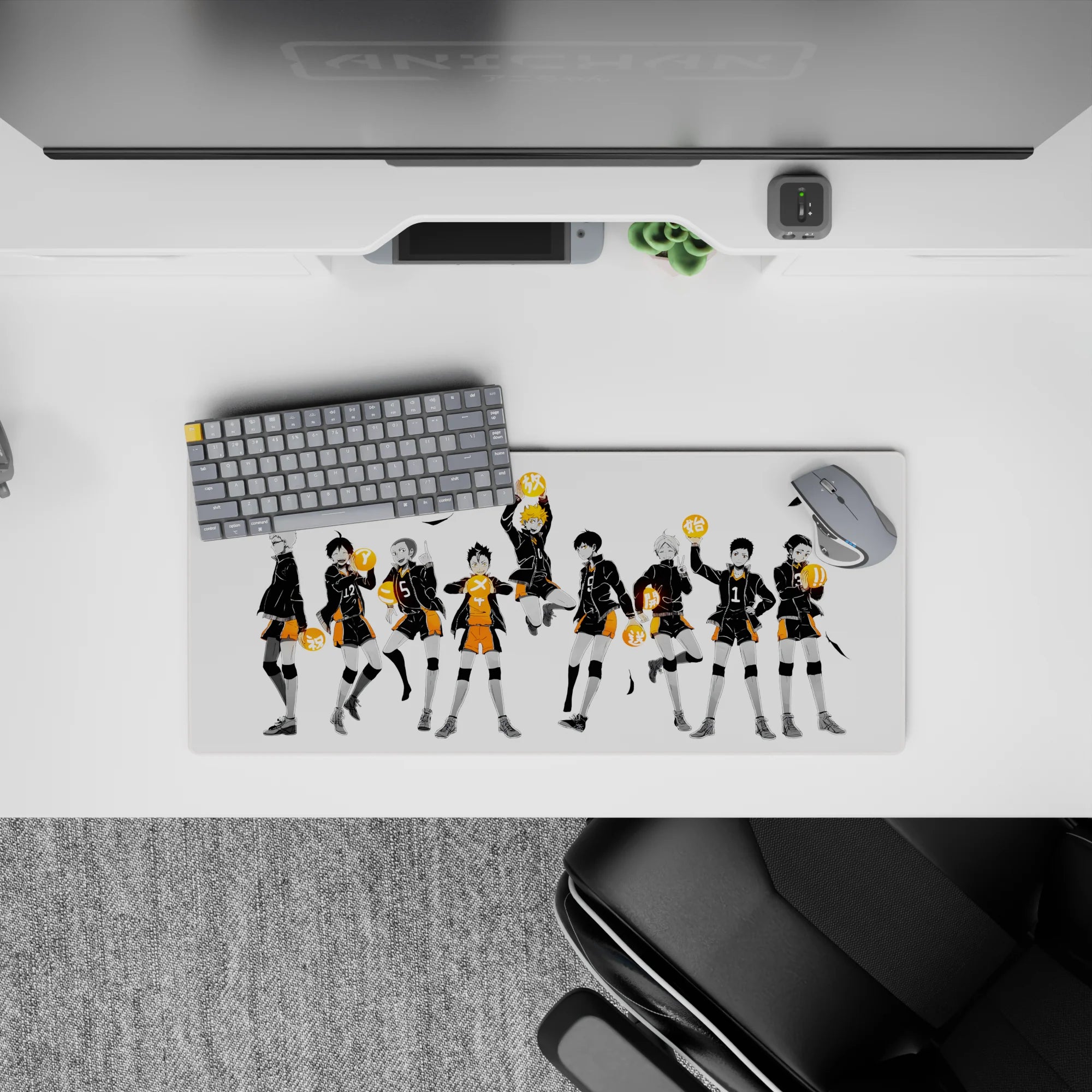 Dramatic black-and-orange volleyball anime mouse pad 28x12 inches, crisp ink lines on white background.