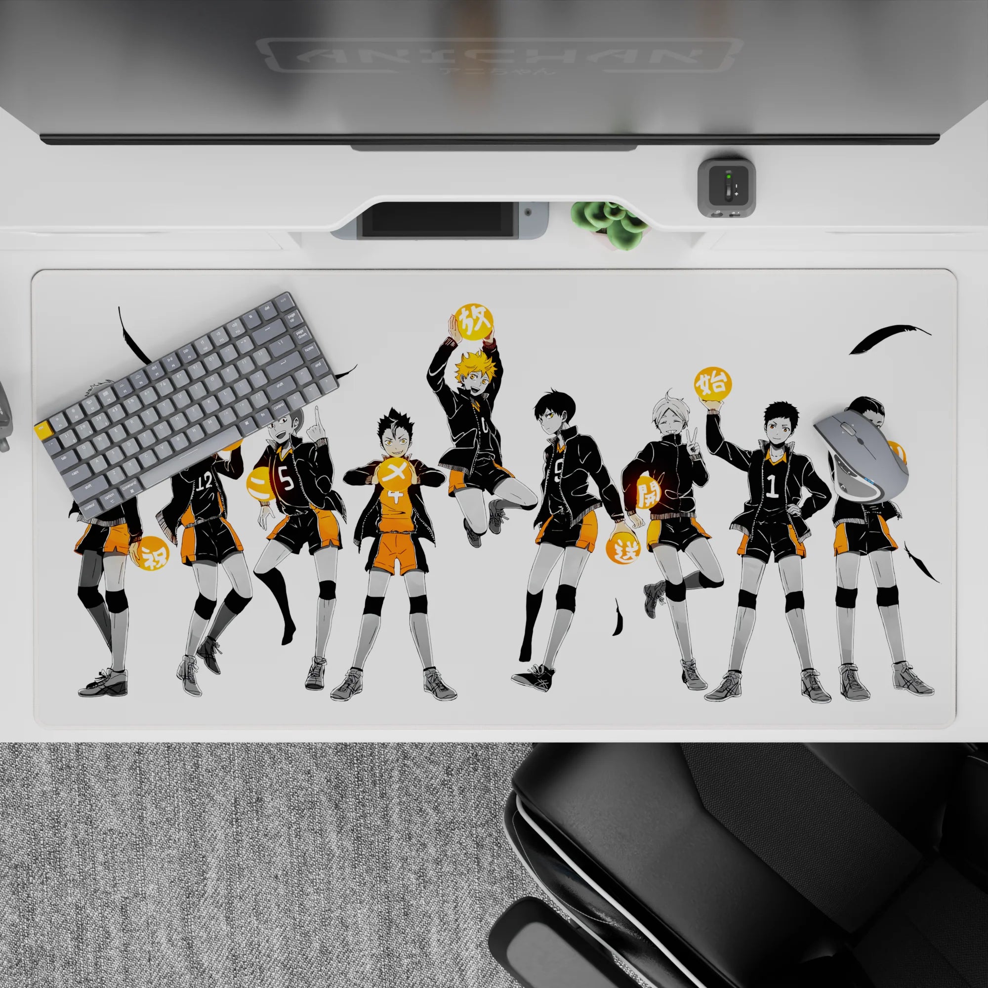 Anime desk pad 40x20 inches in bold black and orange, sharp ink strokes, dramatic yet tidy vibe.