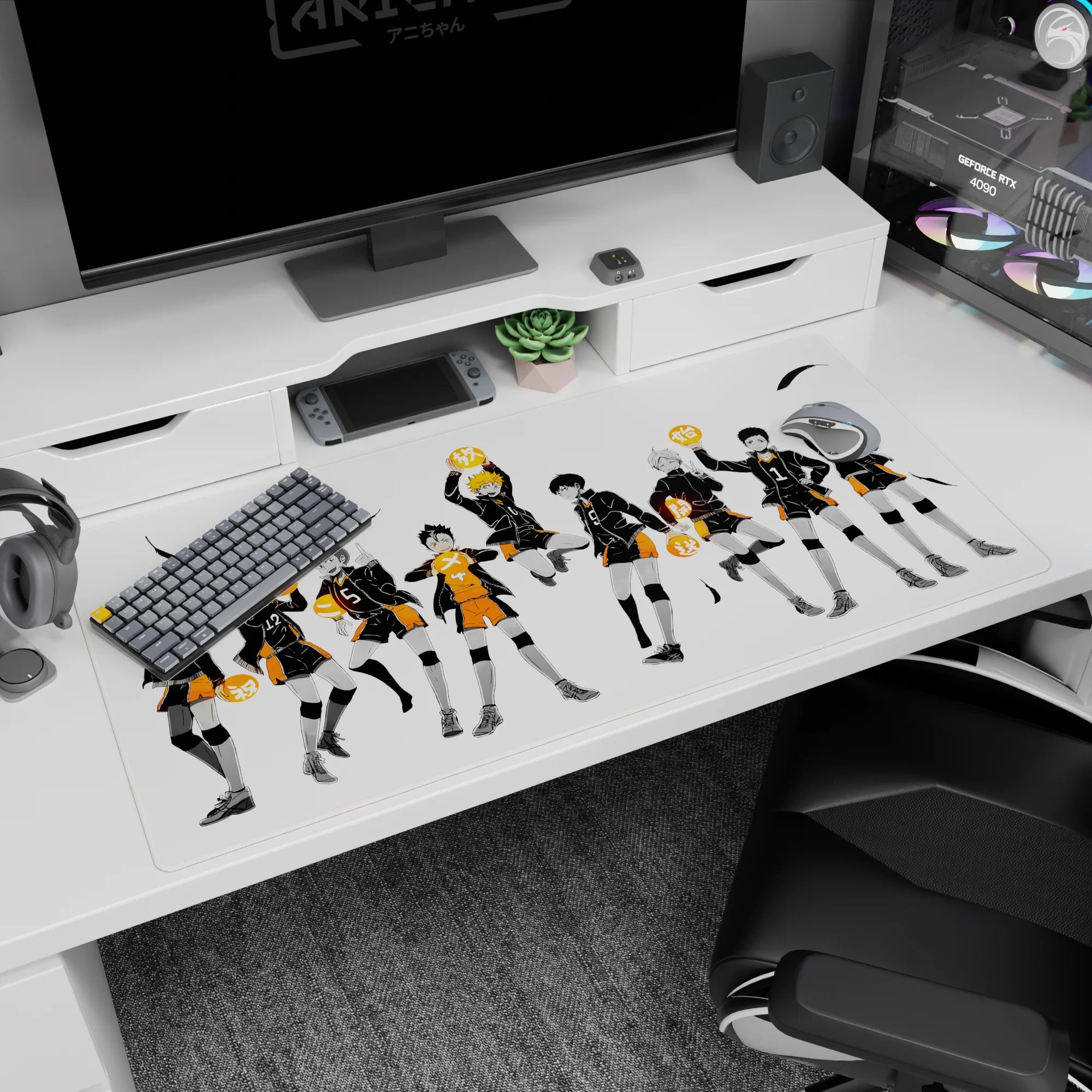 Hinata mid-jump beside cool Kageyama on anime desk pad 40x20 inches, team in black jackets, orange shorts.