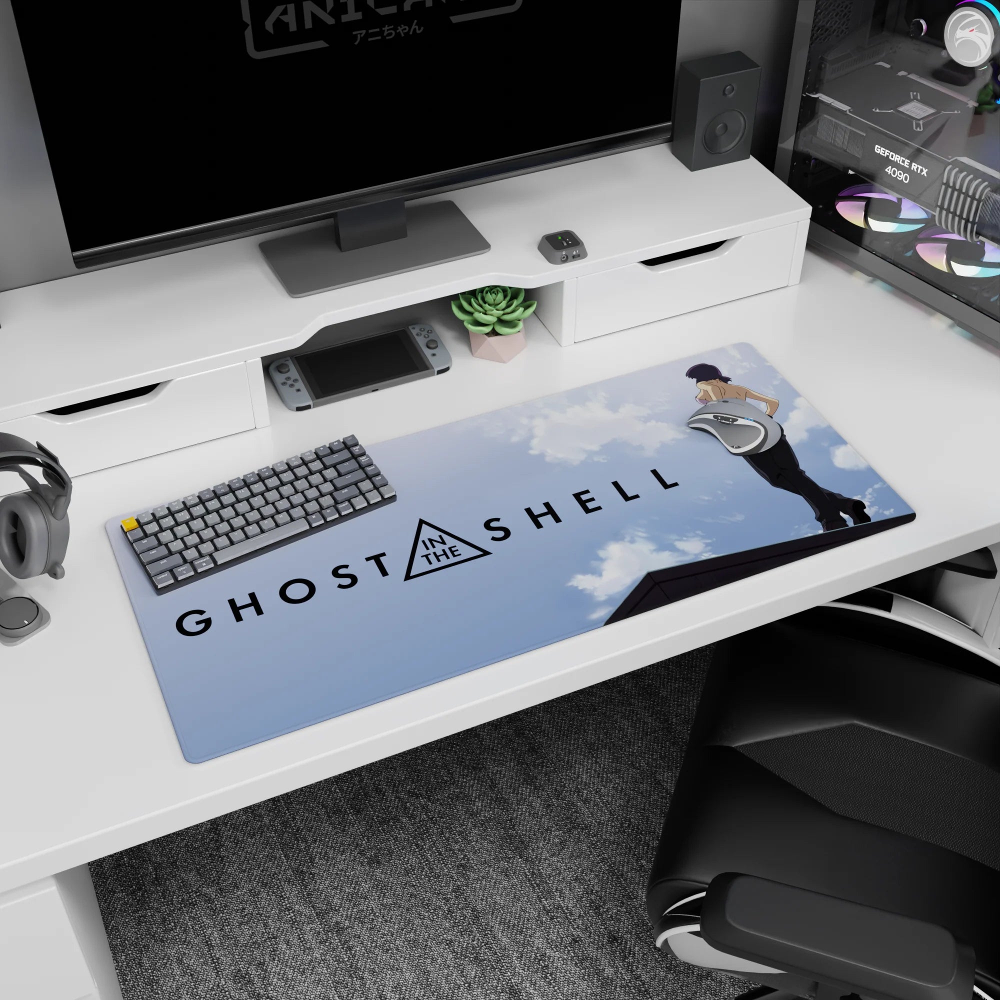 36x16 inches desk pad showing Motoko Kusanagi on a rooftop, over-the-shoulder pose in sleek black outfit.