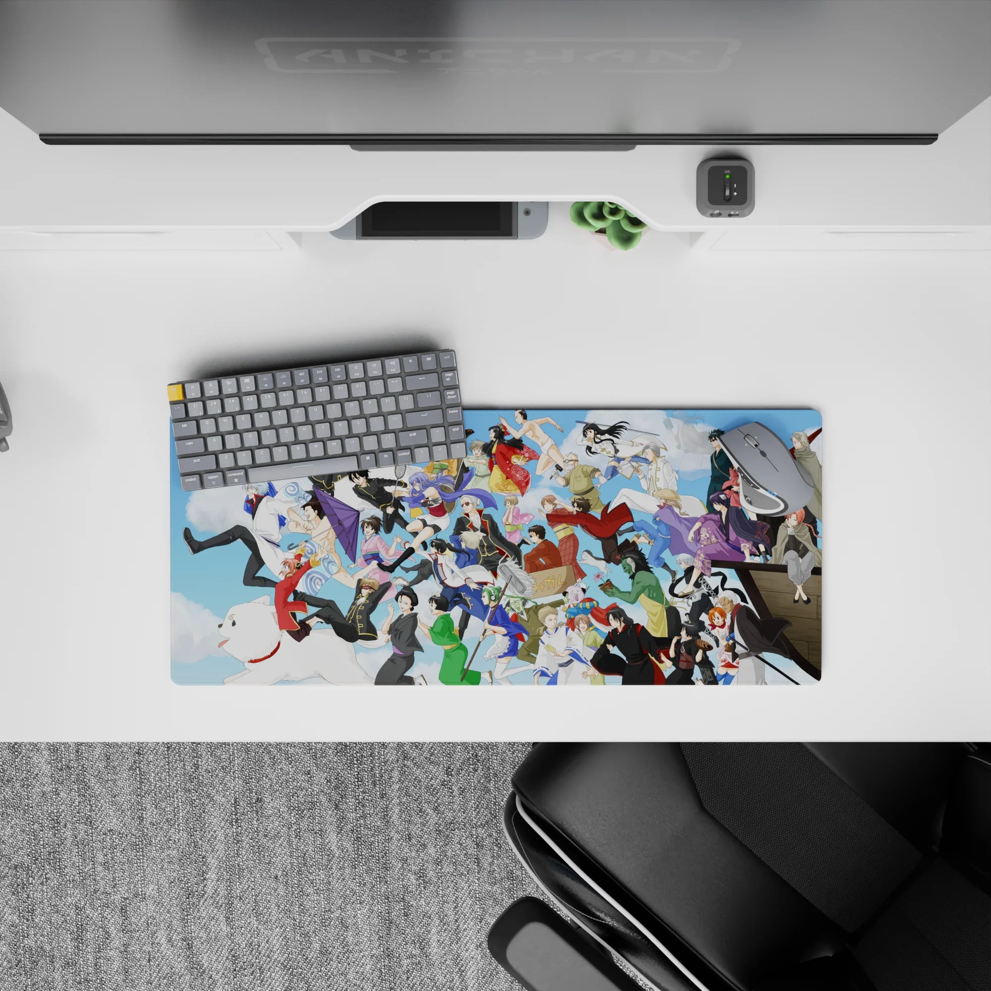 Bright blue Gintama desk pad 28x12 inches, playful and nostalgic with clouds and colorful outfits.
