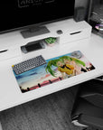 28x12 inches anime girl mouse pad showing two ponytailed girls winking and laughing under a blush sky.