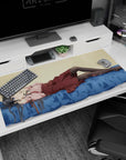 Silver-haired anime girl lounging on blue bed desk pad 40x20 inches, black diamond tights and skirt.