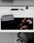 32x12 inches anime mouse pad in ashy blacks and ember reds with crisp white armor and yellow accents.