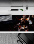 Smoky black and ember red 36x16 inches anime desk pad with bright yellow accents and high-contrast vibe.
