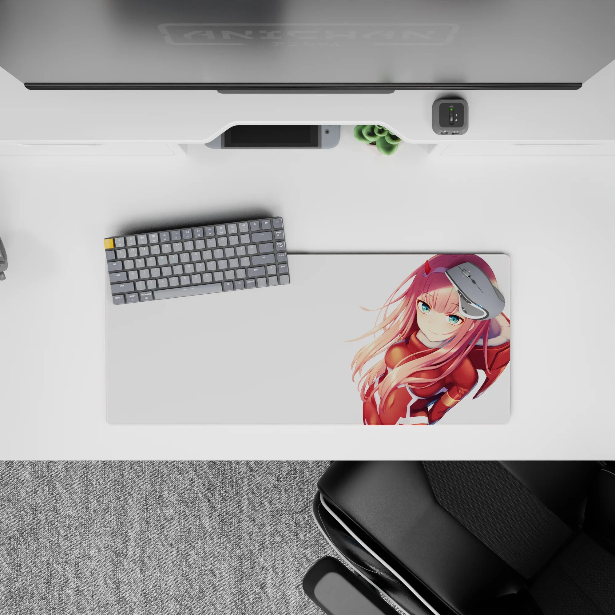 Anime mouse pad featuring Zero Two from Darling in the Franxx, 28x12 inches, showcasing her iconic red suit and pink hair.