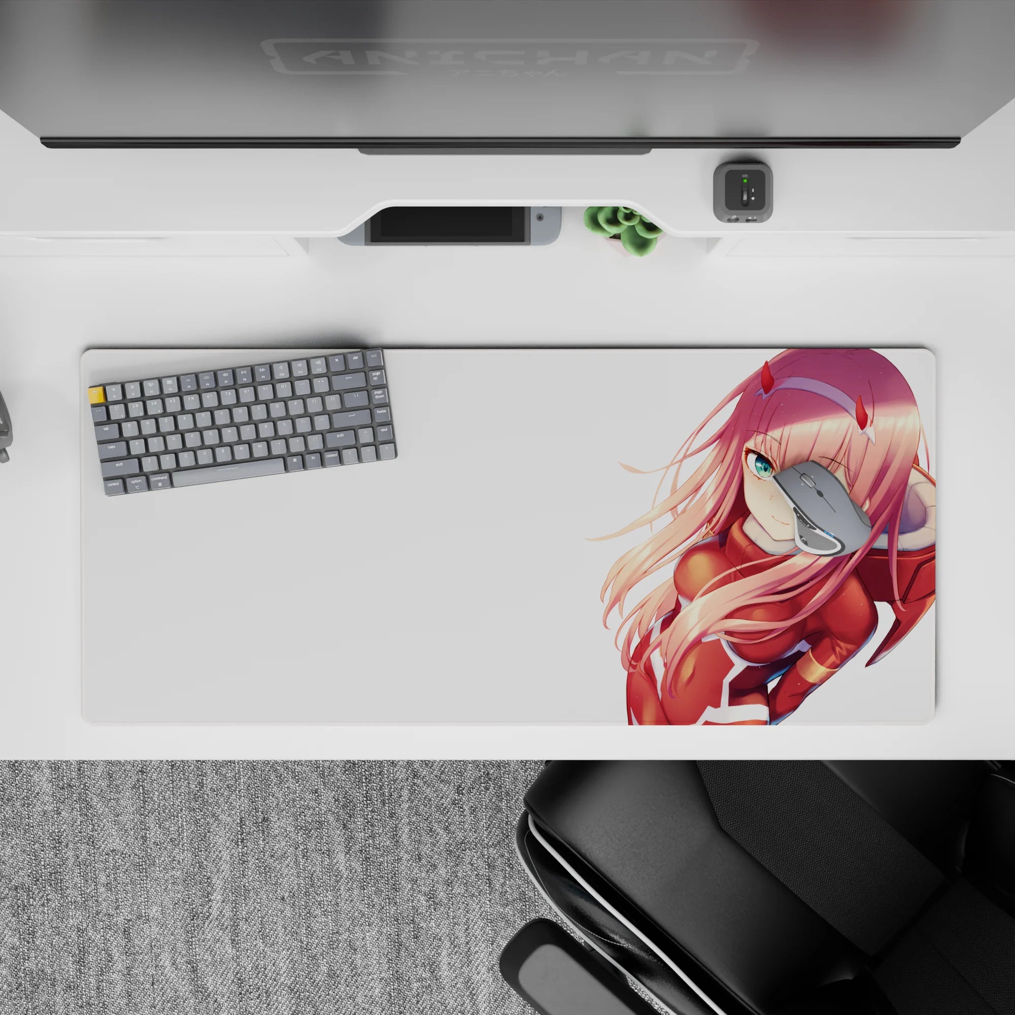 Anime mouse pad featuring Zero Two from Darling in the Franxx, 36x16 inches, with her iconic red suit and pink hair.