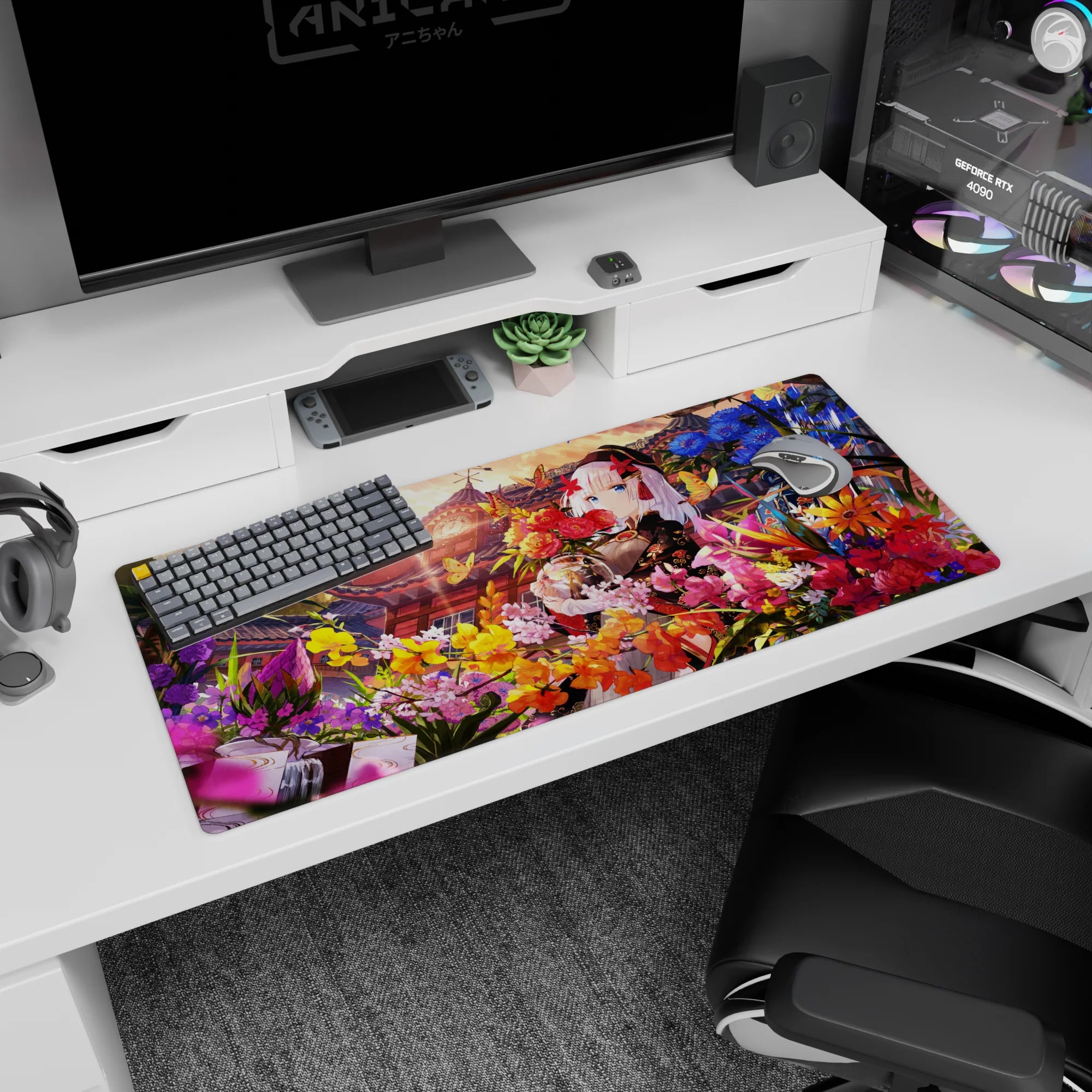Anime girl desk pad 36x16 inches showing silver-haired girl in black kimono hugging bouquet in blooms.