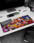 Anime girl desk pad 36x16 inches showing silver-haired girl in black kimono hugging bouquet in blooms.