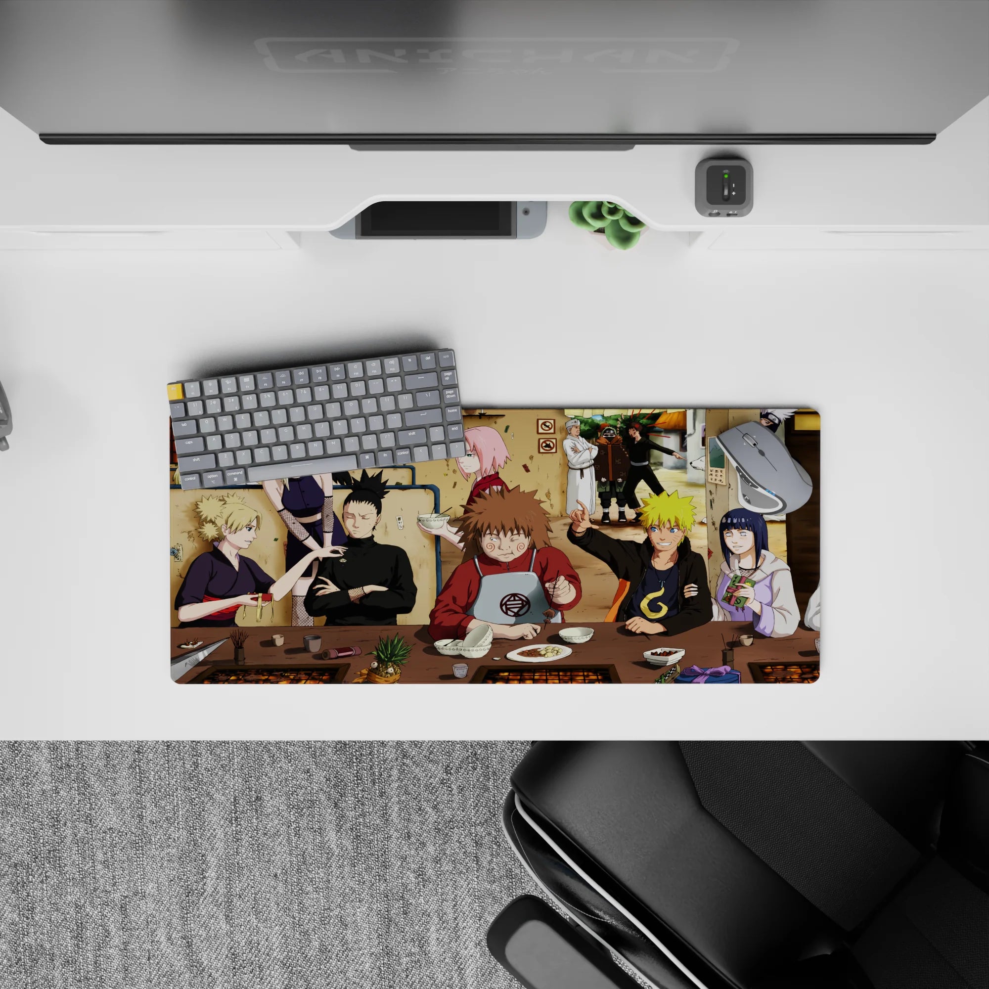 28x12 inches anime mouse pad with warm tan tones, pink and blond pops, and comfy ramen-shop chaos.