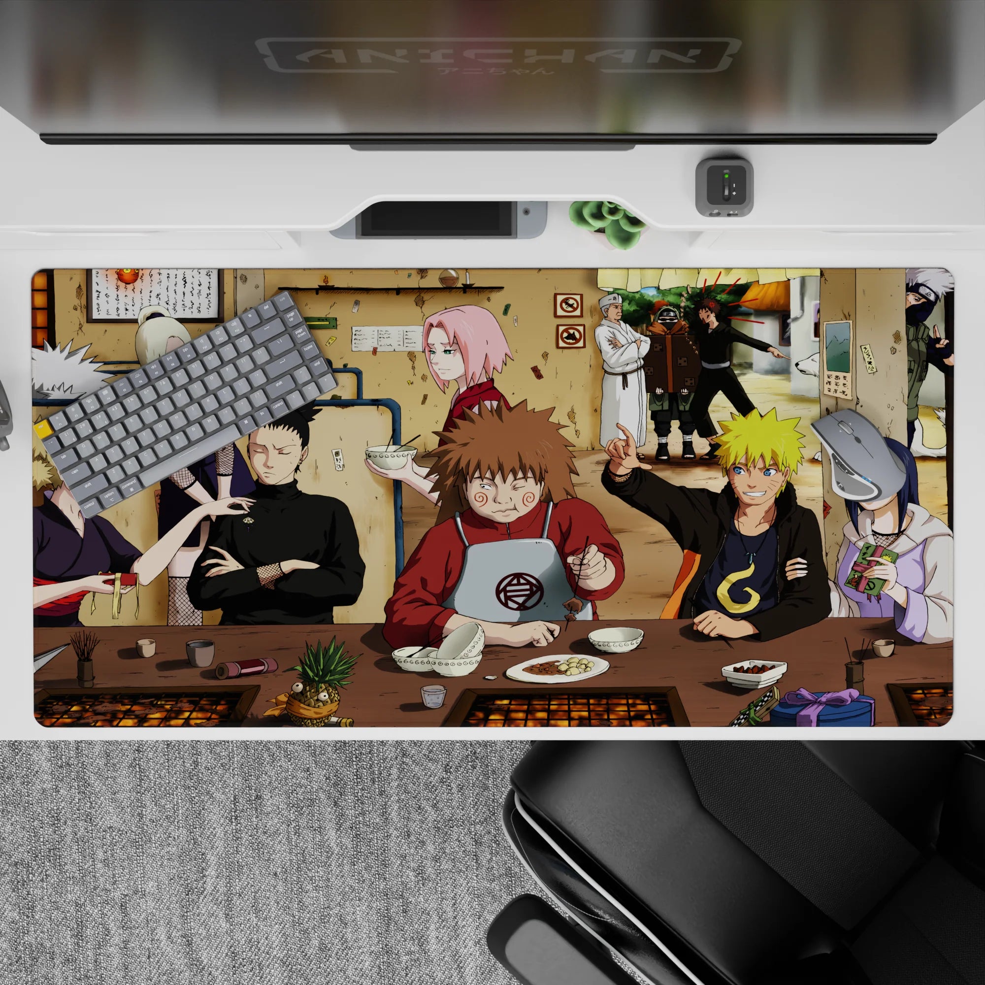 Cozy tan ramen-shop chaos anime desk pad, 40x20 inches, with pink and blond pops and warm vibes.