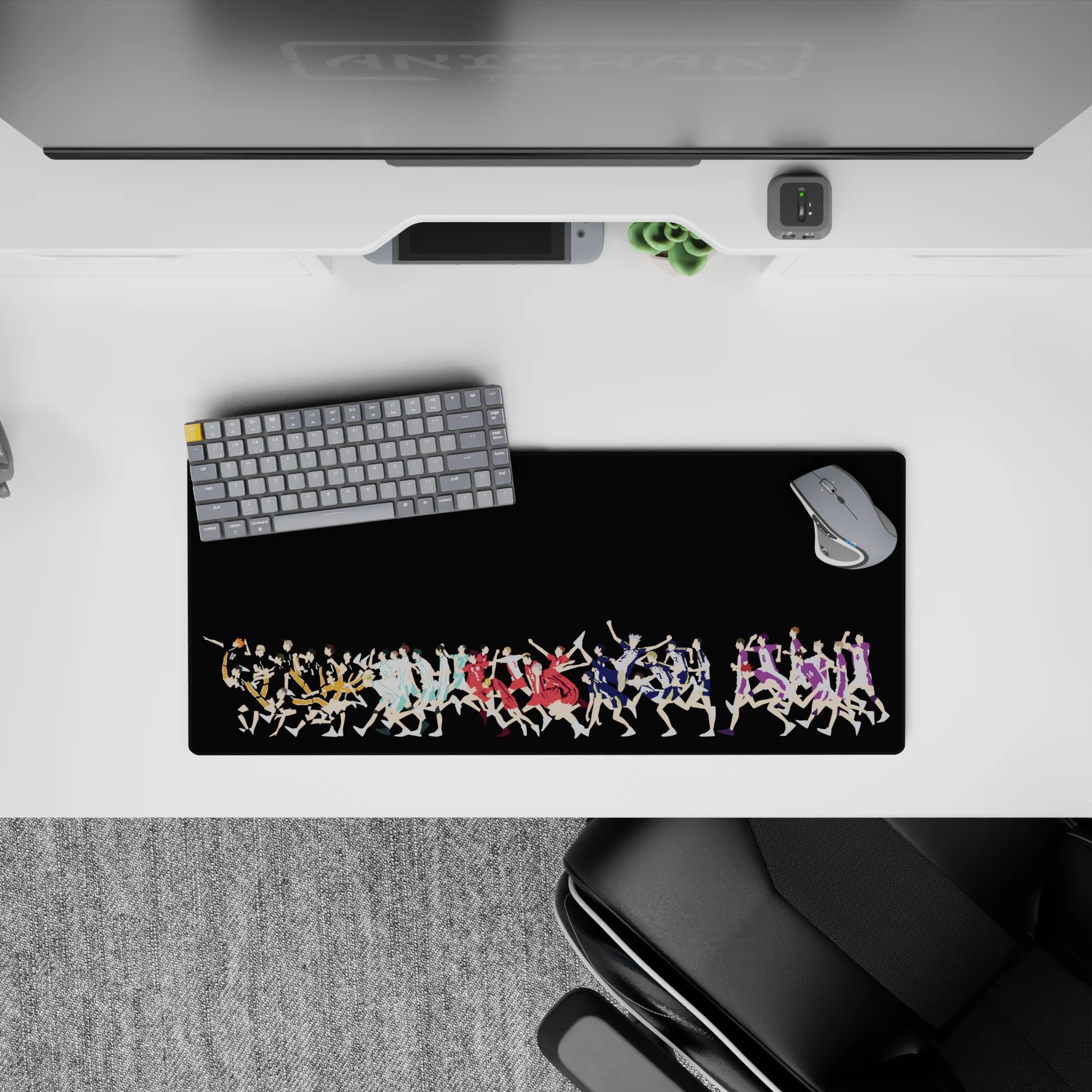 High-contrast anime mouse pad 28x12 inches with orange, teal, red, purple volleyball rivals.