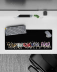 High-contrast anime mouse pad 28x12 inches with orange, teal, red, purple volleyball rivals.