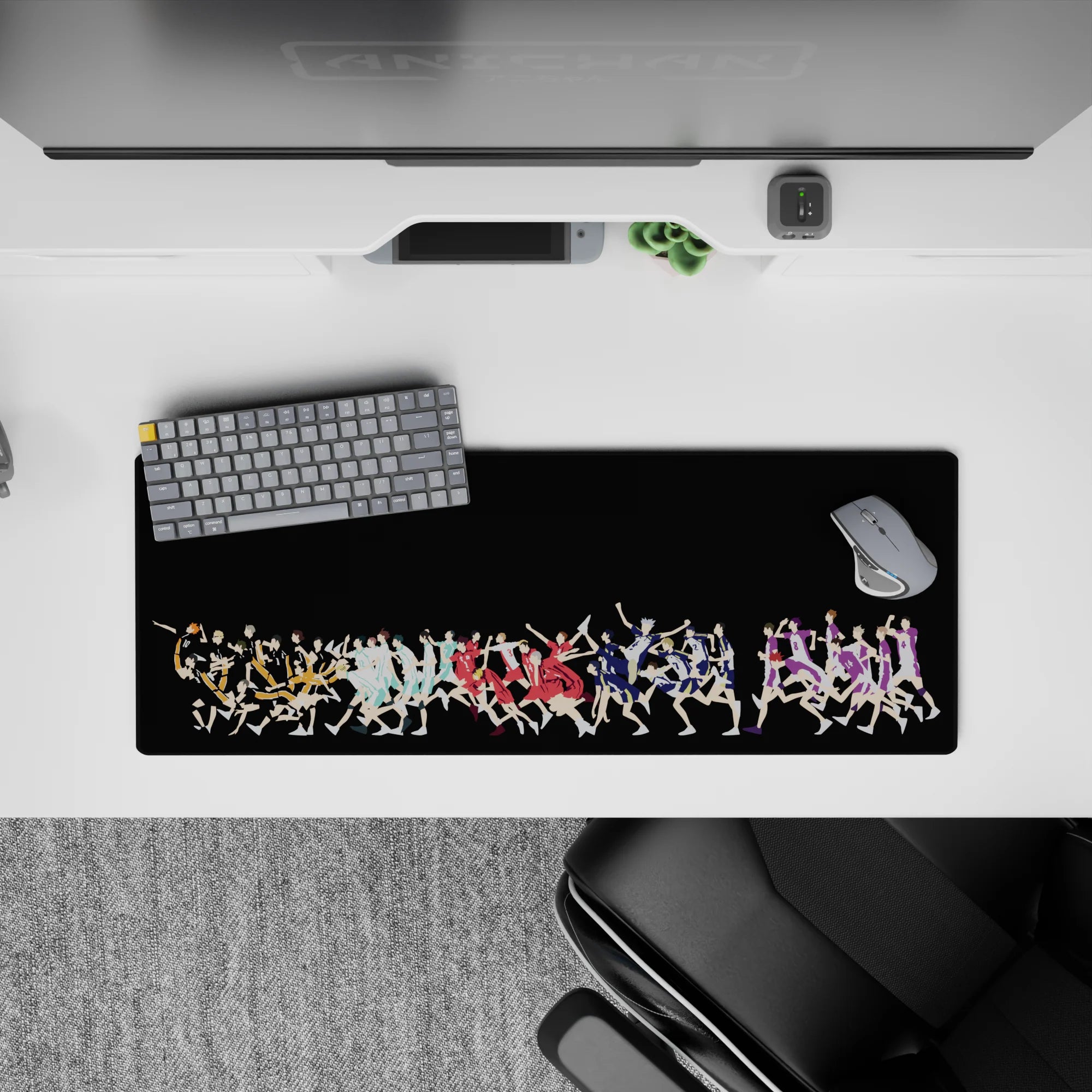 High-contrast anime mouse pad, black with orange, teal, red, blue, purple players, 32x12 inches.