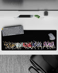 High-contrast anime mouse pad, black with orange, teal, red, blue, purple players, 32x12 inches.