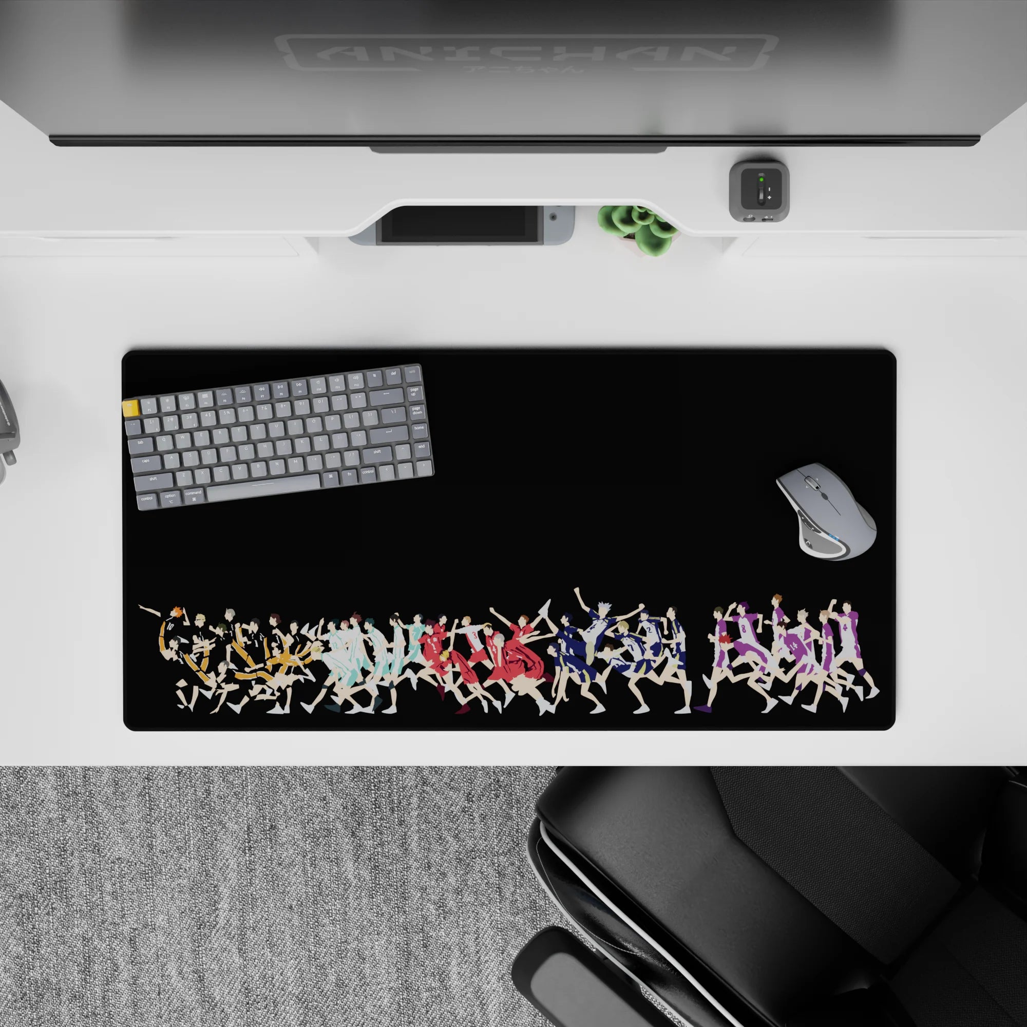 32x16 inches anime mouse pad in orange, icy teal, bold red, midnight blue, and royal purple on black.