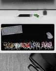 32x16 inches anime mouse pad in orange, icy teal, bold red, midnight blue, and royal purple on black.