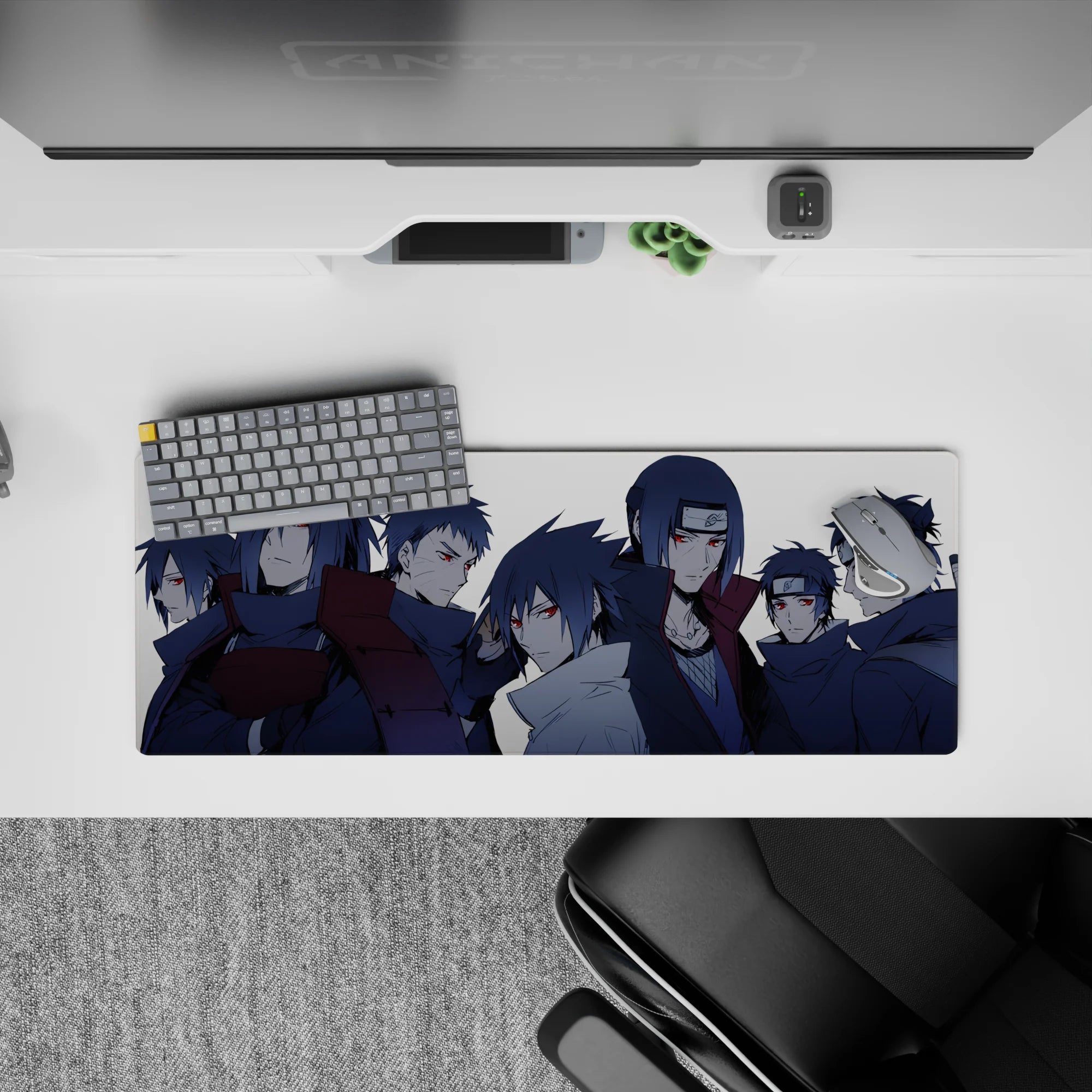 Steel-blue shadowed anime mouse pad 32x12 inches with red Sharingan eyes, clean but dangerous vibe.