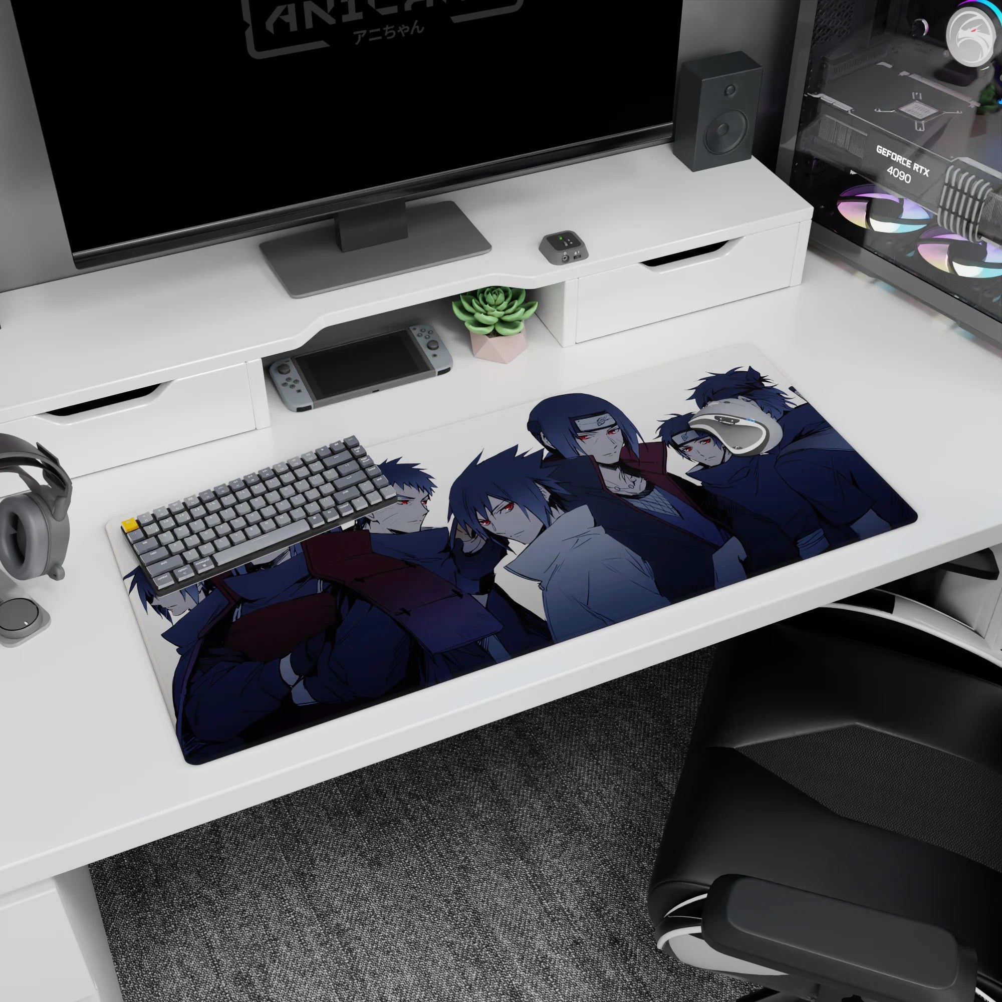 Sasuke, Itachi, Madara and Obito Uchiha lineup on extended anime desk pad 36x16 inches.