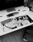 36x16 inches anime desk pad showing two faces pressed close, cuts and bruises detailed, hands entwined.