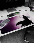 Naruto-inspired Sasuke-style shinobi in shadow before a huge moon desk pad, 40x20 inches.