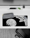 28x12 inches anime mouse pad in stark black and white, bold contrast sci-fi mood with ink splashes and debris.