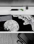 36x16 inches monochrome manga-style desk pad, stark black ink splashes and a quiet brave deep-space mood.