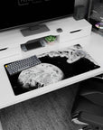 32x16 inches anime mouse pad showing a lone caped hero diving past debris toward a glowing planet.