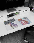 28x12 inches anime mouse pad showing boy in gray coat looking away from blonde girl in pink coat and scarf.