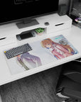 32x16 inches anime mouse pad showing distant couple: gray-coated boy turned away, girl in pink and white scarf.