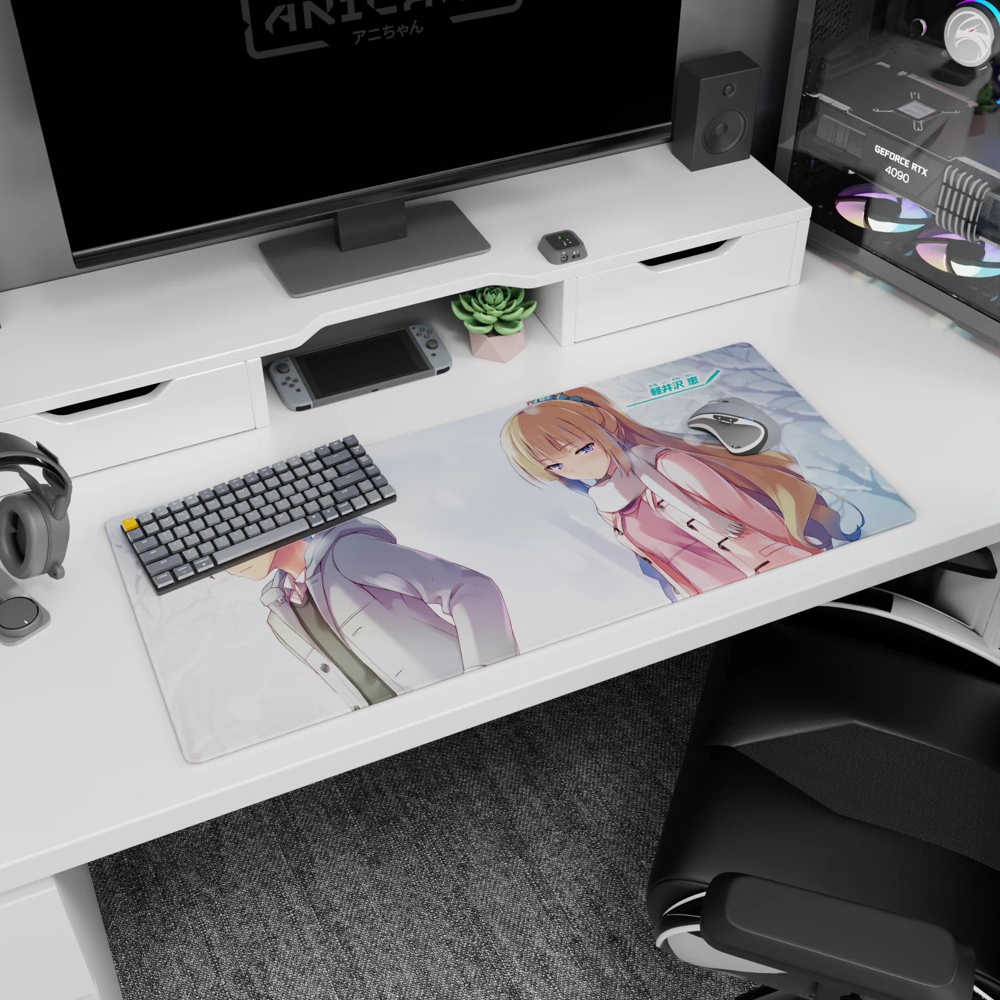 36x16 inches anime desk pad showing distant couple in snowfall, blonde girl in pink coat, boy looking away.