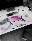 Close-up pouty anime idol girl on desk pad 40x20 inches, pink twin-tails with teal ribbon accents.