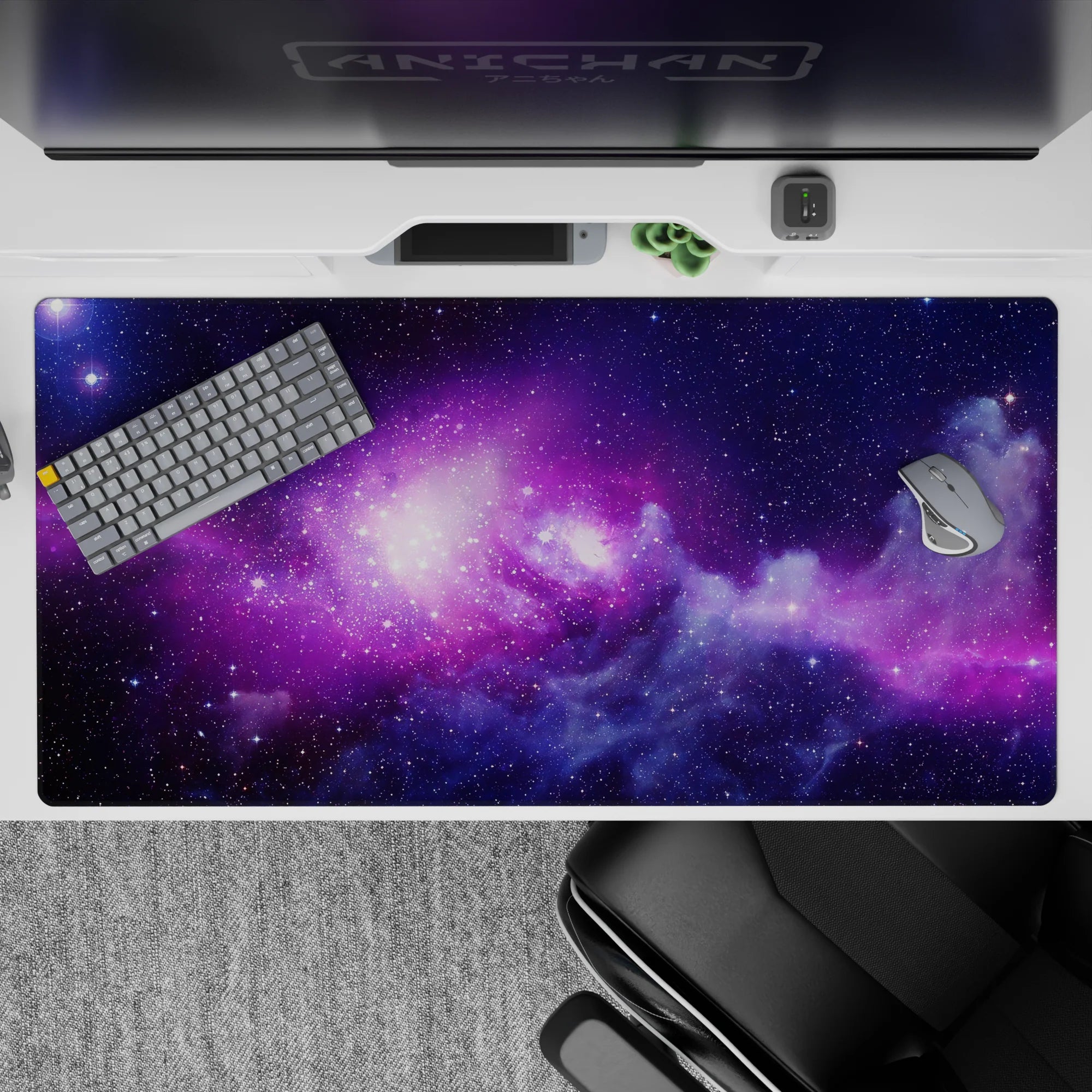 Violet and indigo cosmic desk pad with calming dreamy glow, 40x20 inches.