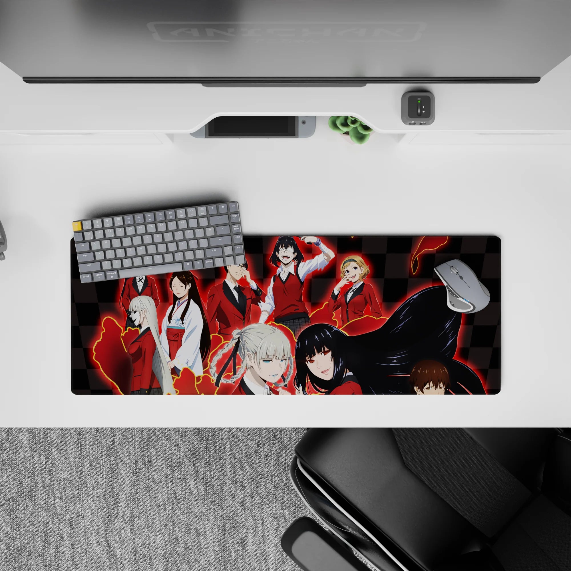 Red-and-black anime mouse pad 32x12 inches with glossy checkerboard, electric red glow, and edgy school vibe.