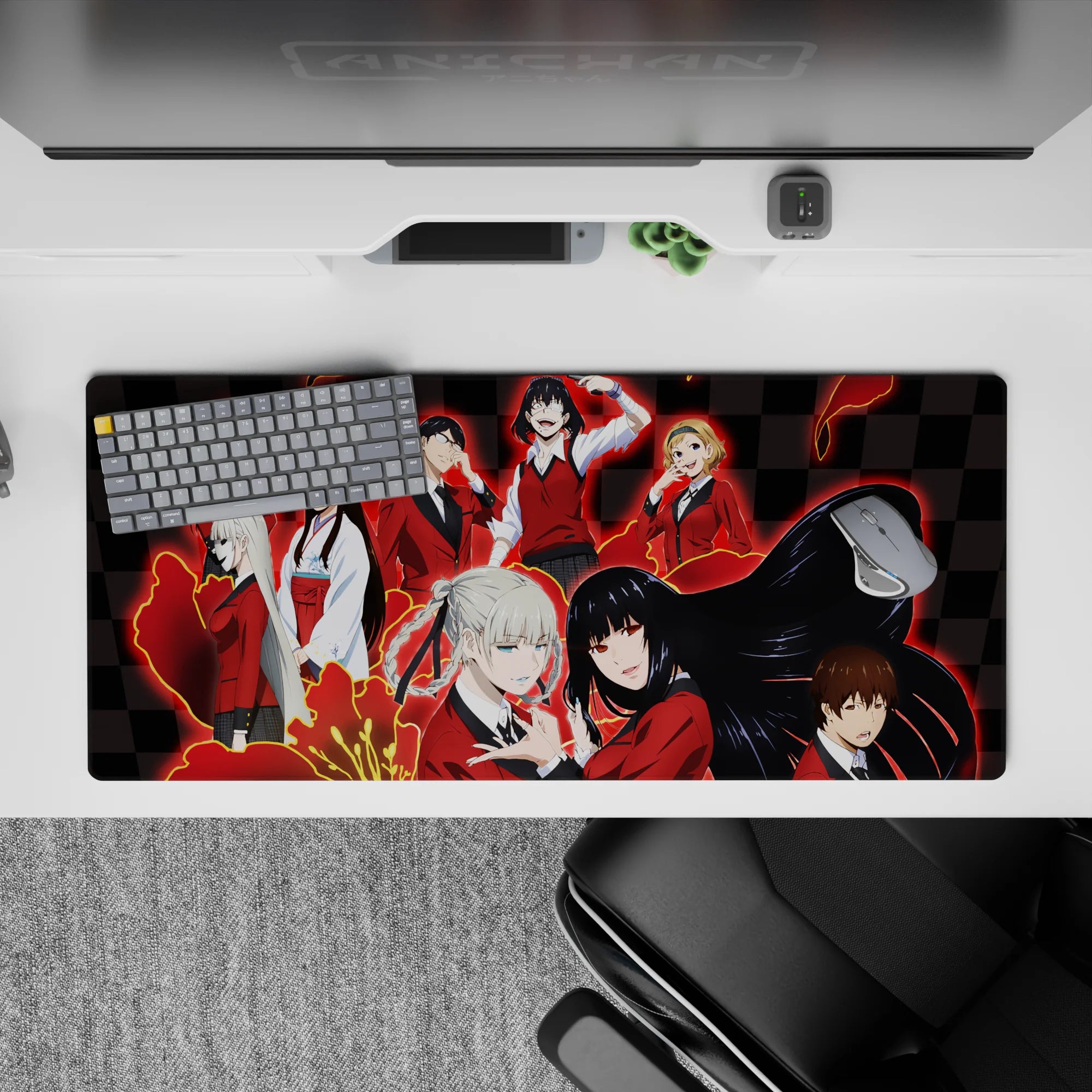 Anime desk pad 36x16 inches in electric red glow with splashy streaks and mischievous classroom vibe.