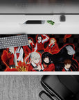 Anime desk pad 36x16 inches in electric red glow with splashy streaks and mischievous classroom vibe.