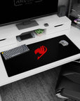 36x16 inches anime desk pad featuring a sharp red flame-style guild crest stamped on a black field.