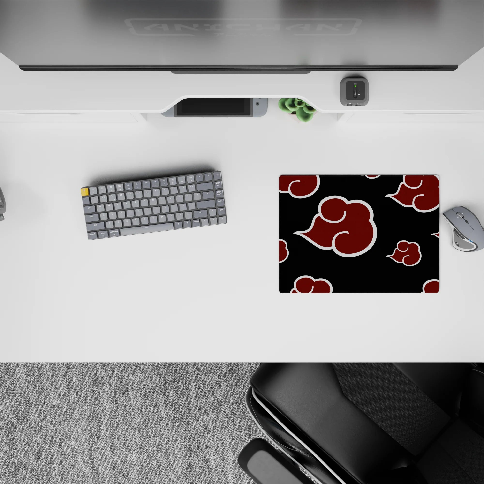 Classic 14x10 inches anime mouse pad in deep black with crimson clouds, bold villain-core mood.