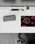 Classic 14x10 inches anime mouse pad in deep black with crimson clouds, bold villain-core mood.