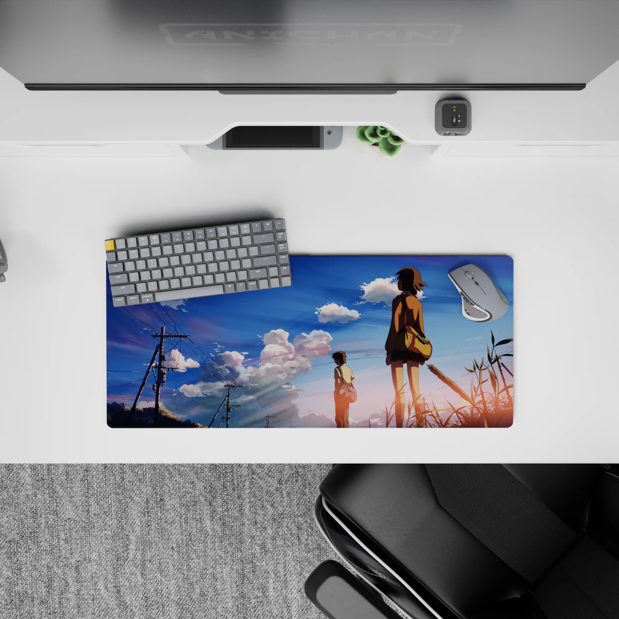 28x12 inches anime desk pad in calm golden hour gradient, pink lavender clouds, airy sky, warm serene mood.