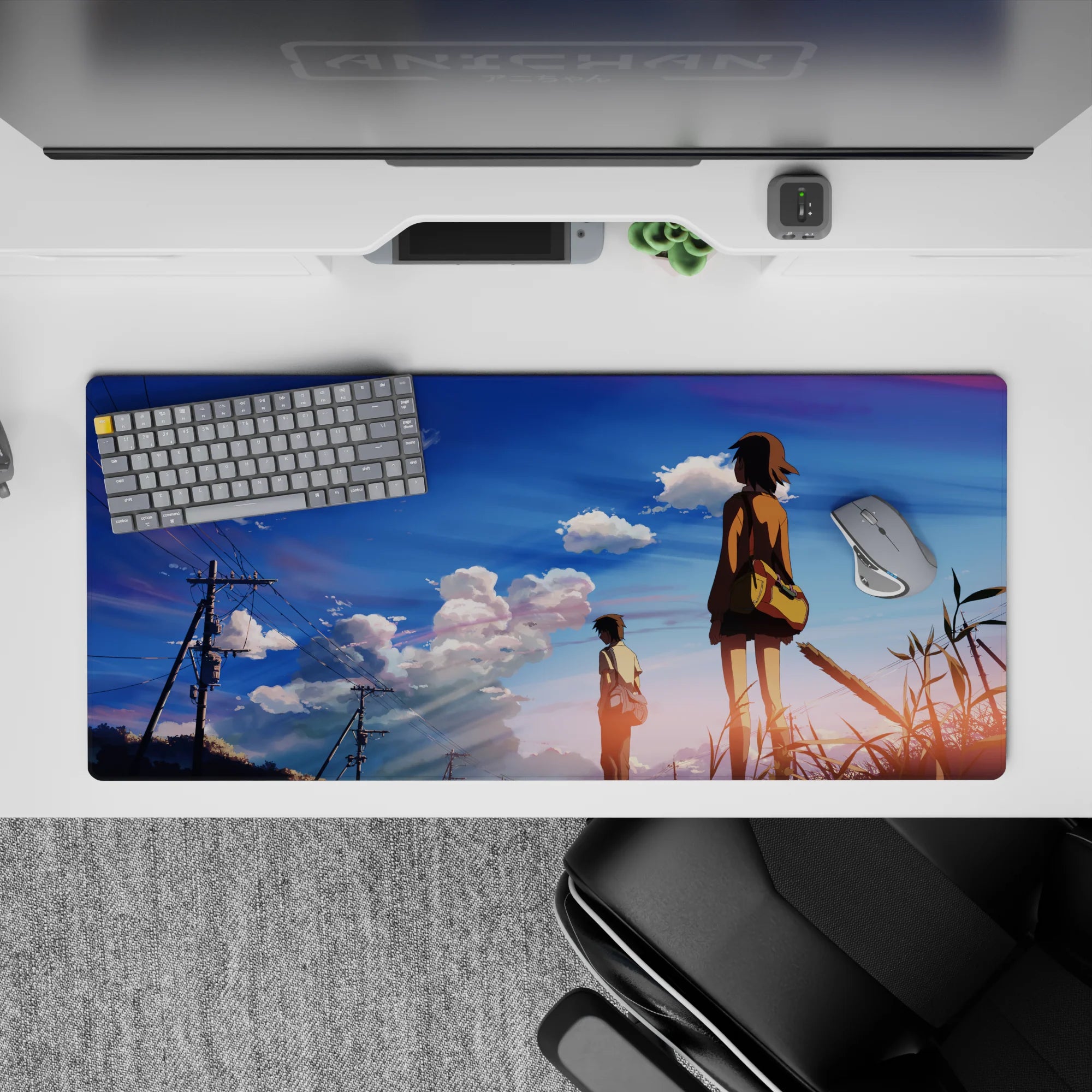 Calming 36x16 inches anime desk pad in blue sunset gradient with pink-lavender clouds and airy space.