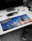 36x16 inches anime desk pad showing girl in cardigan with shoulder bag, boy behind, quiet walk home scene.