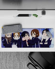 Cozy snowy night anime girl mouse pad 32x12 inches in soft blue and violet glow with warm scarf accents.