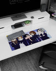 Yui Hirasawa and friends giggling in winter scarves anime girl mouse pad 28x12 inches with heart bag detail.