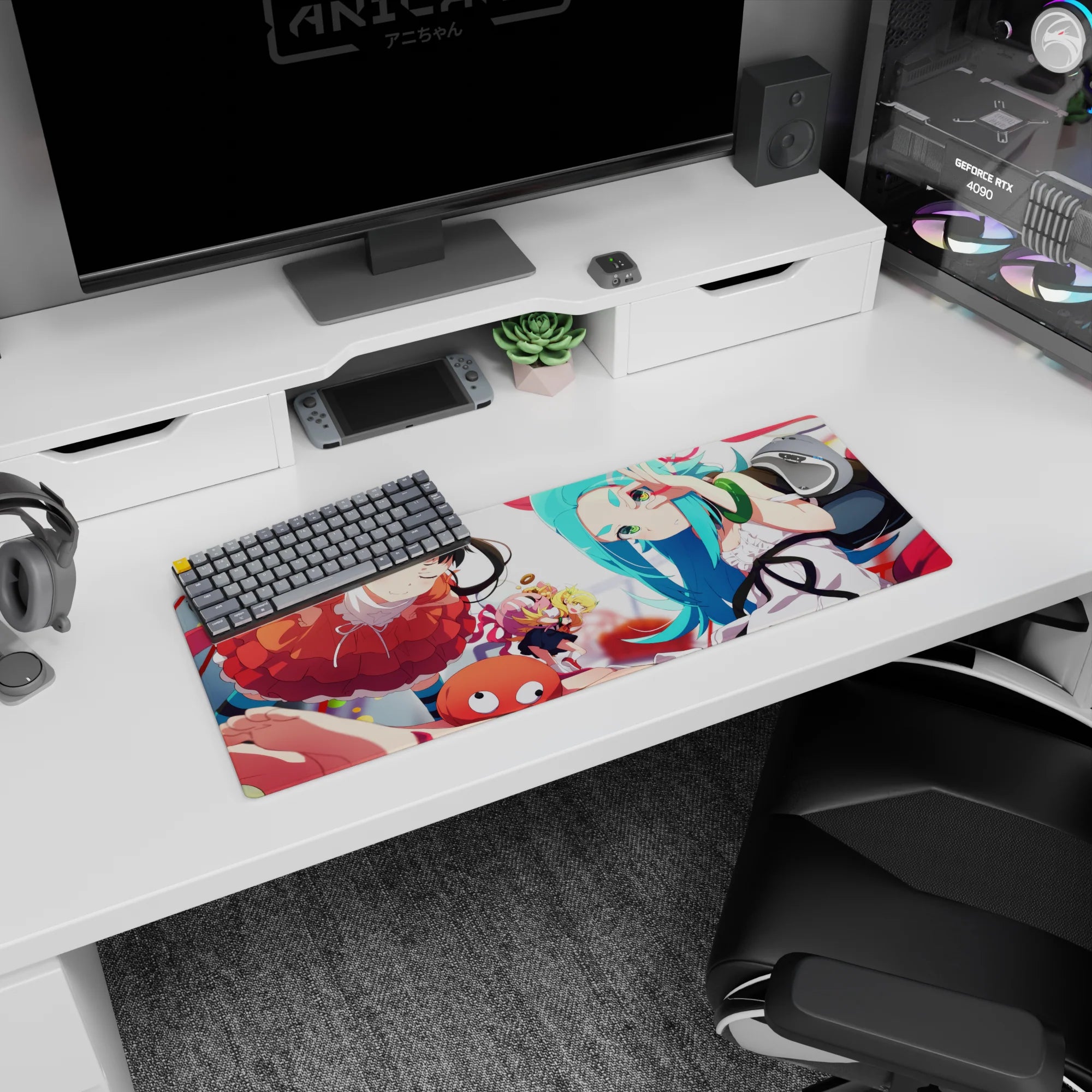 32x12 inches Monogatari Series mouse pad featuring Karen Araragi winking and Shinobu Oshino popping in.