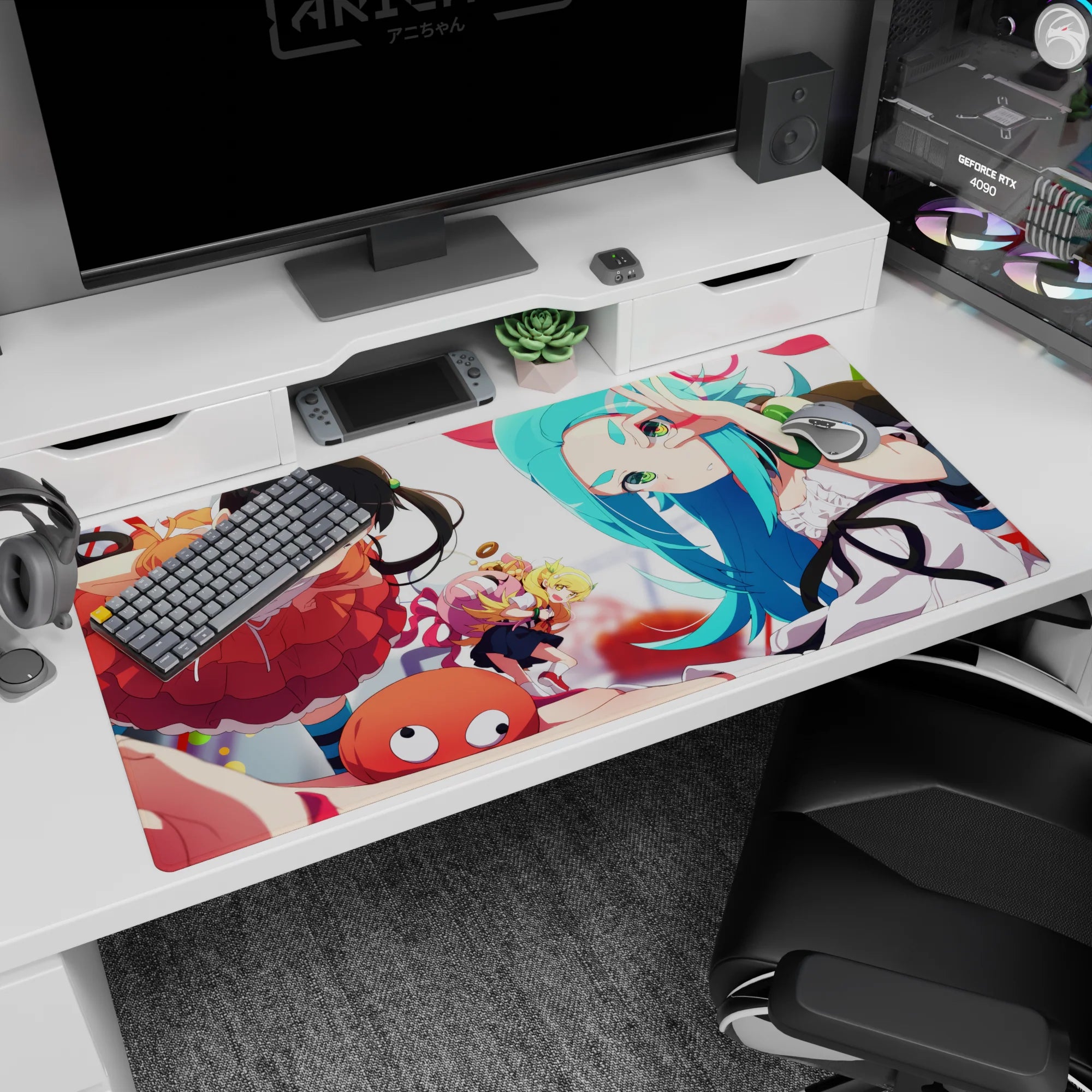 Karen Araragi winking with Shinobu peeking in on an anime girl desk pad 40x20 inches, candy shapes floating.