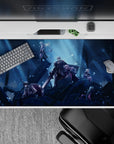 Moody 40x20 inches anime desk pad in cold blue spotlight tones with deep shadows and spark-like snowfall.