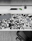 36x16 inches anime desk pad in stark black and white, grim chaotic horror mood with heavy ink shadows.