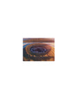 Classic anime mouse pad 14x10 inches with vast crater skyline, golden cliffs, wildflowers, and spiral clouds.